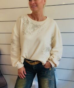 Cremefarbener Strickpullover mit Strass