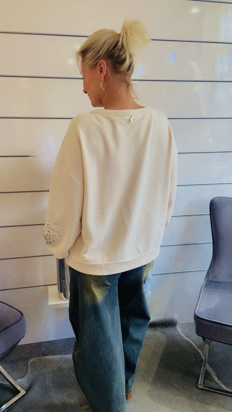 Cremefarbener Strickpullover mit Strass